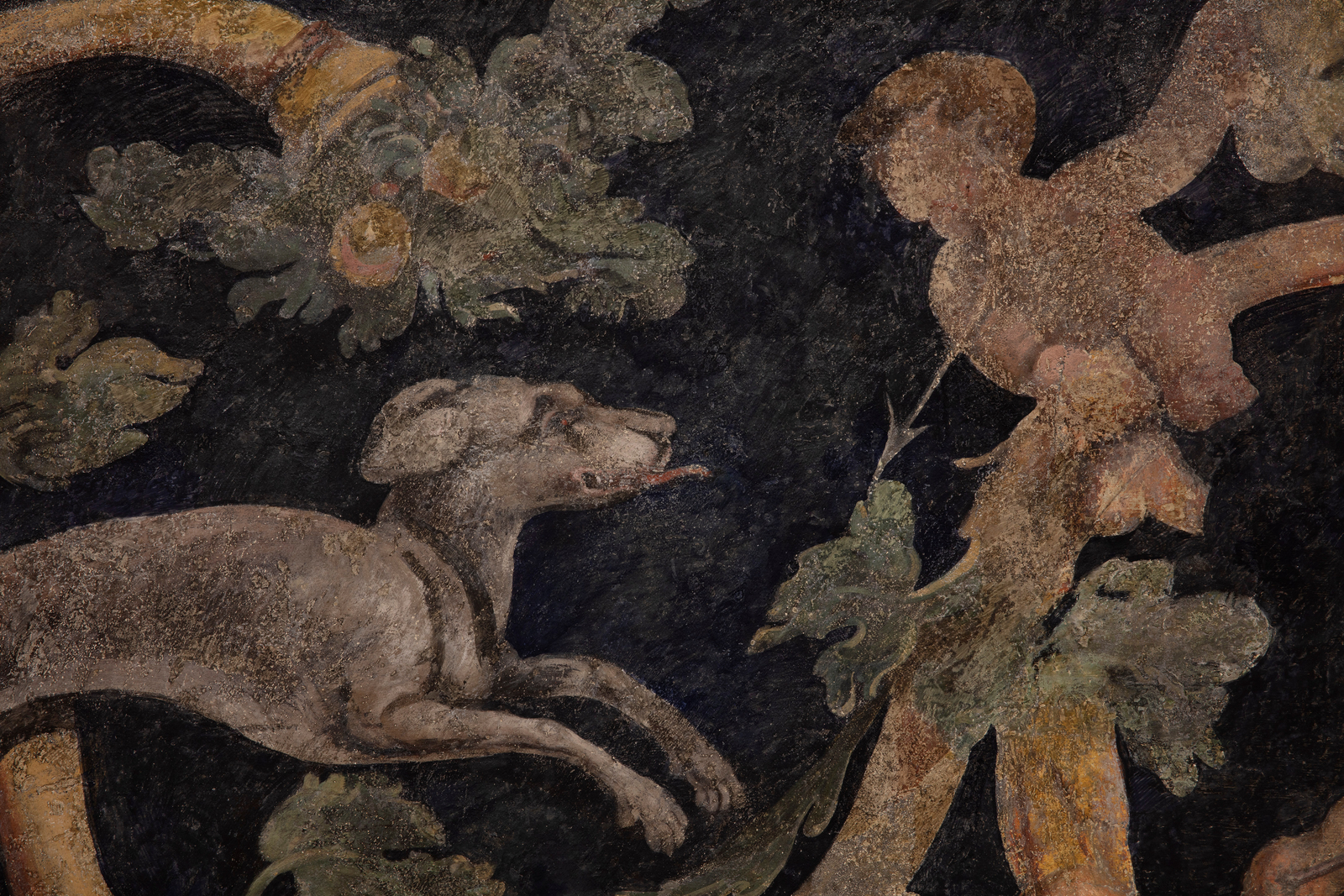 detail of a fresco depicting grotesques and the god Mars