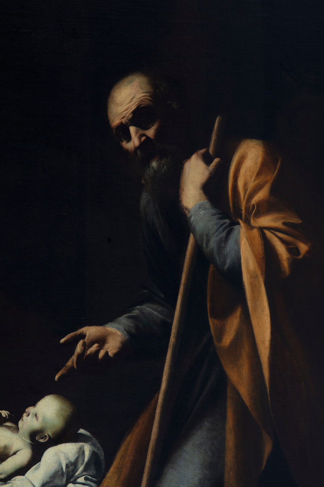 Detail of an oil painting of the nativity.