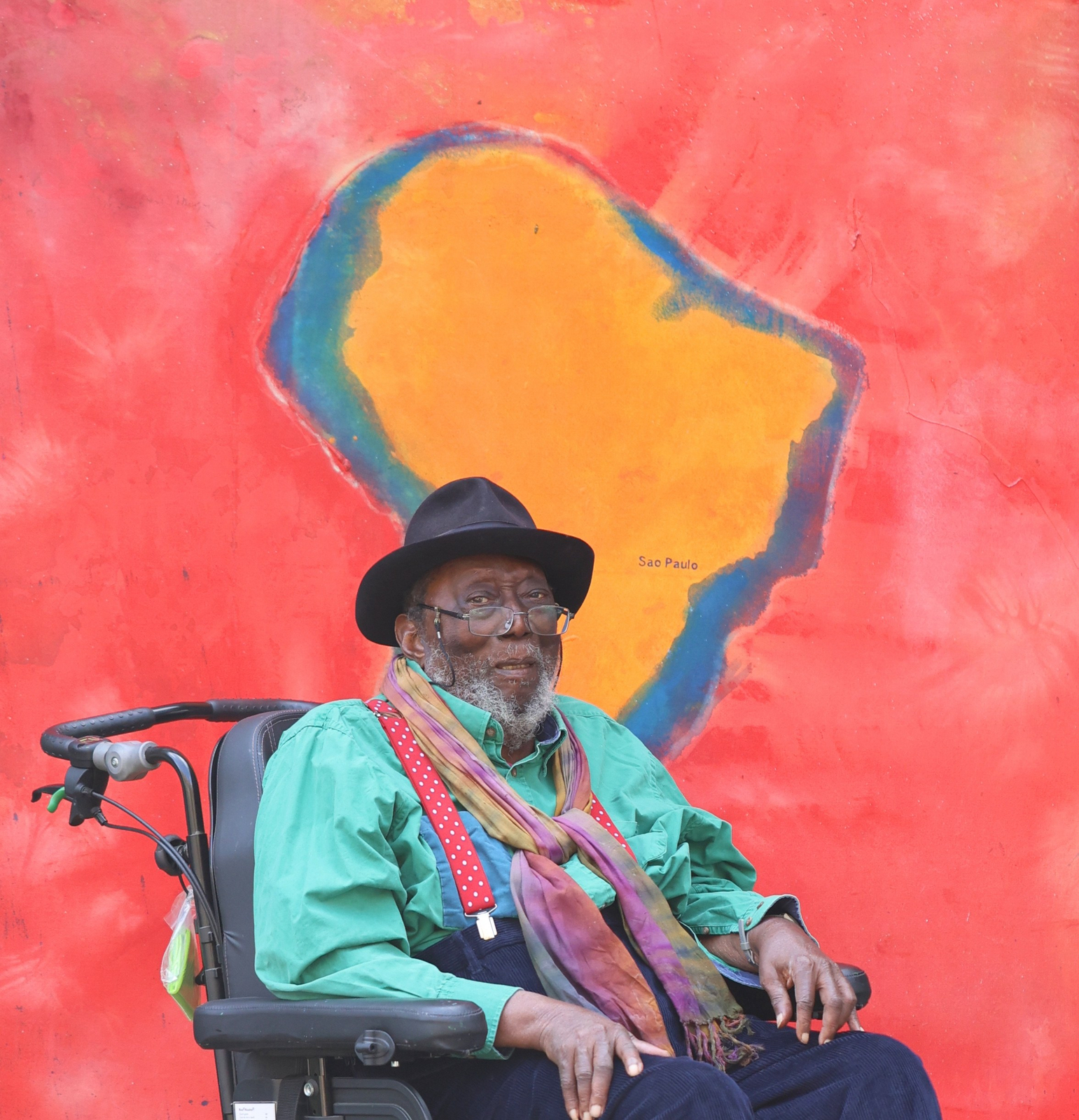 Sir Frank Bowling outside his studio in front of September
