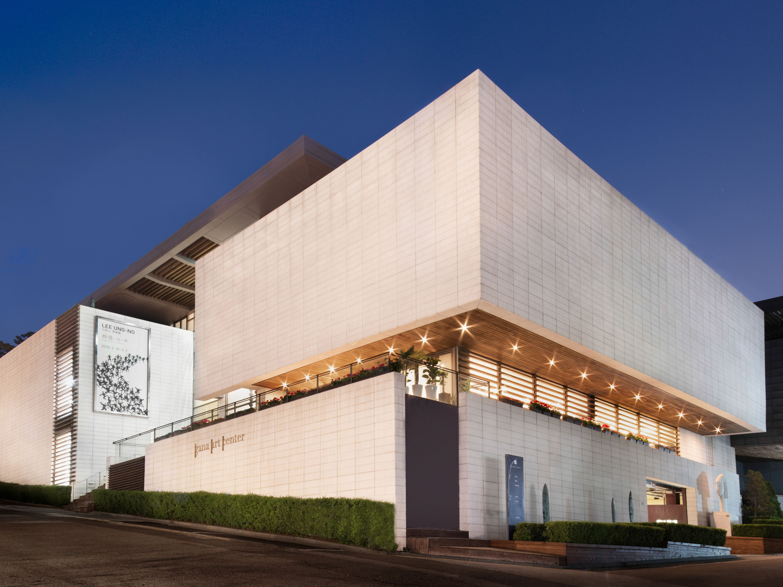 The exterior of Gana Art's large modernist building.