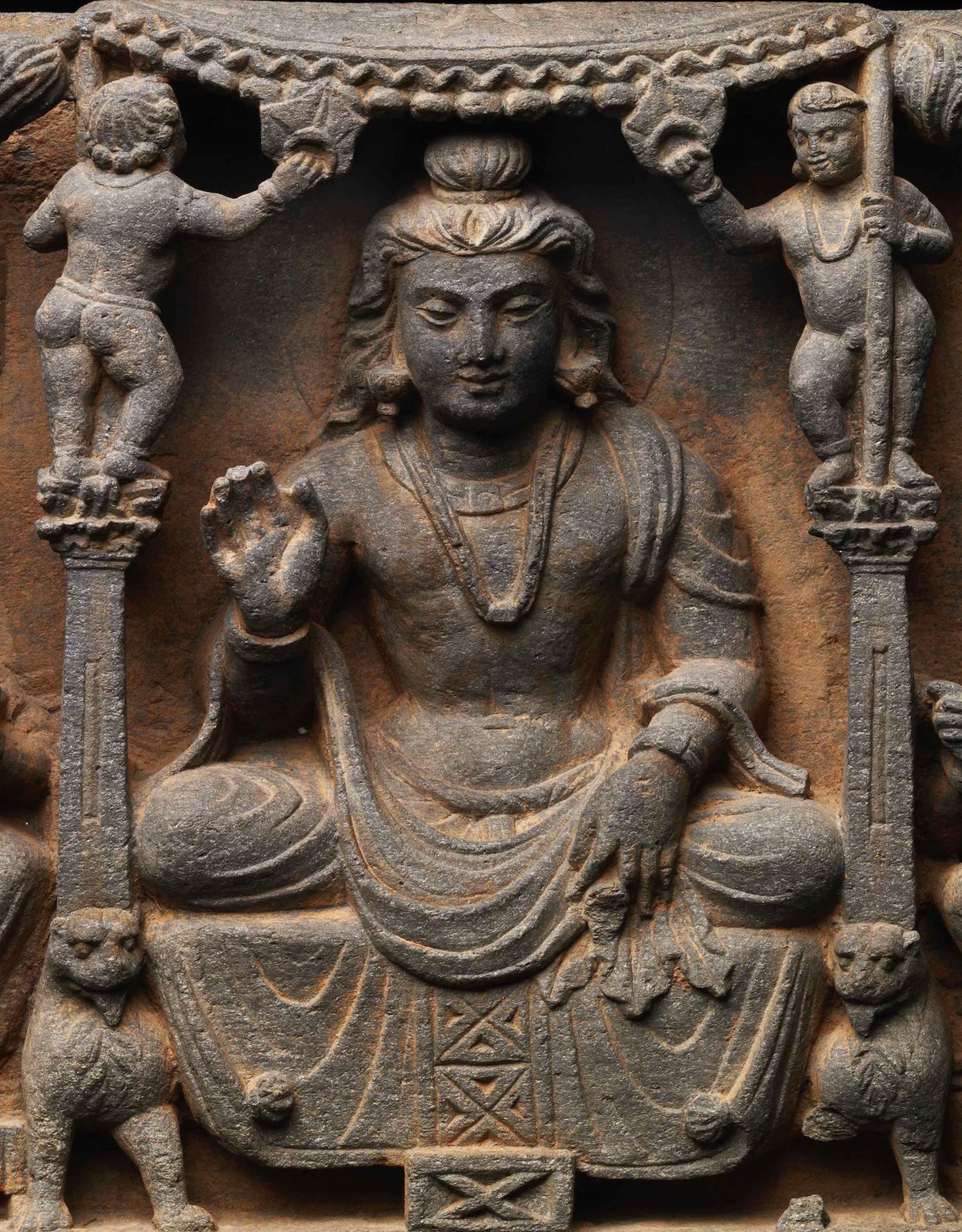 This finely carved relief panel depicts Maitreya (“The Benevolent One”), the future Buddha, shown enthroned in Tushita Heaven as a bodhisattva awaiting the moment of his final rebirth. 