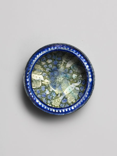 <span class="title"><em>A ‘Sultanabad’ bowl with flying phoenixes </em>, c. 1260-1320</span>