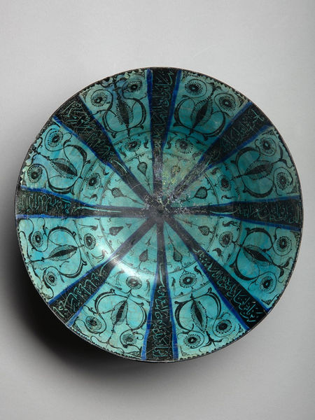<span class="title"><em>A large underglaze-painted turquoise bowl, Iran, probably Kashan</em>, c. 1200-1220</span>