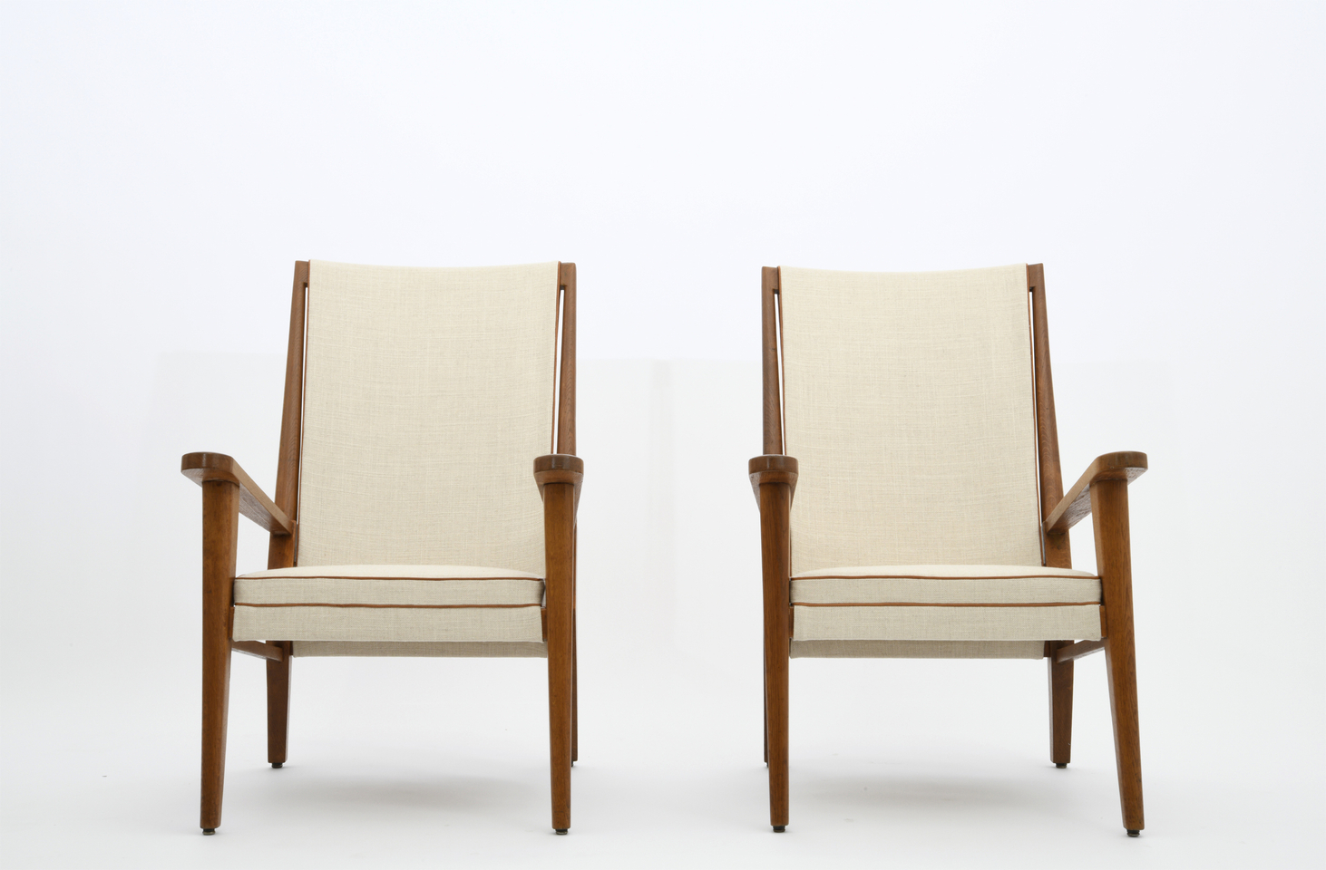Jacques Adnet's pair of armchairs front view