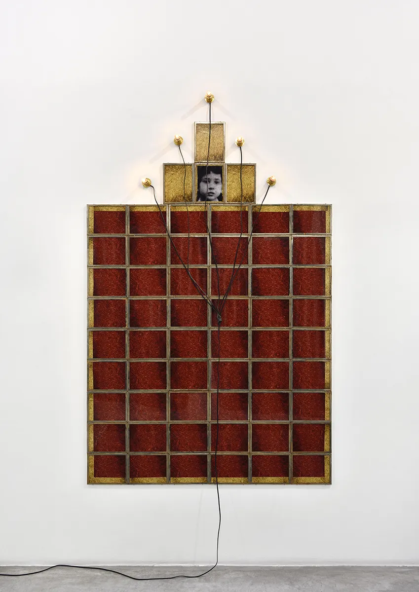Christian Boltanski Monument, 1987 57 framed color photographs, 1 black and white photograph, 5 light bulbs, electric wire 68 7/8...