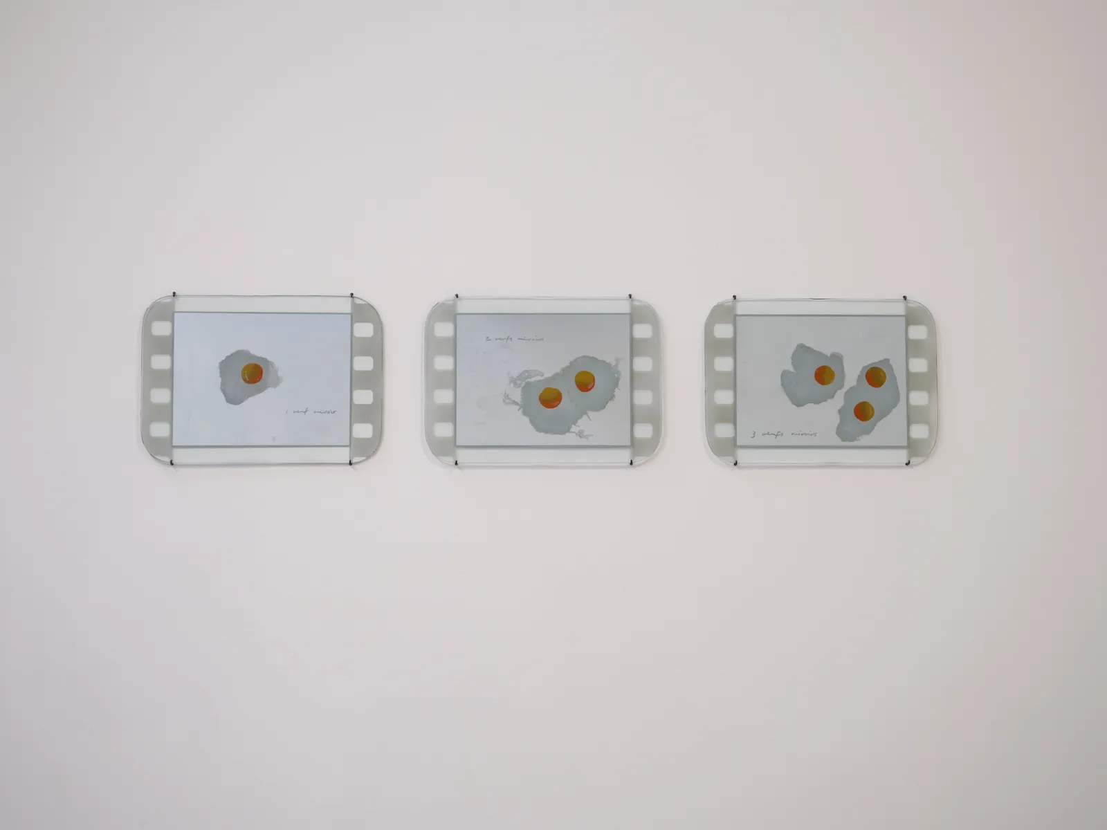Tacita Dean Locomotive Drawings: Oeufs Miroirs (triptych), 2025 Enamel and mirror lacquer on found tarnished steam train windows 12 1/4...