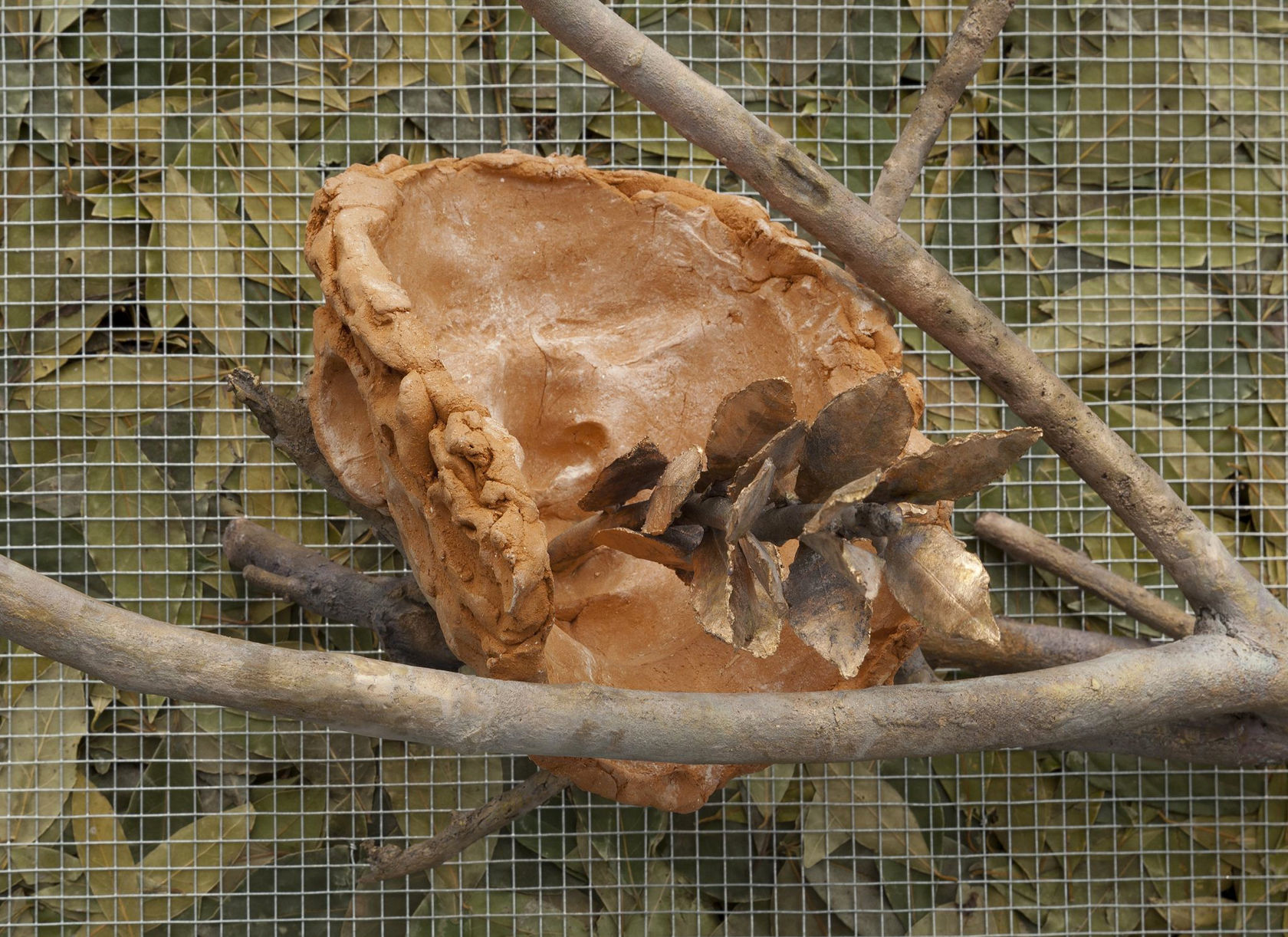 Giuseppe Penone Respirare L'ombra, 2008 Metallic wire, laurel leaves, bronze, terra cotta, variable elements 46 1/6 x 30 11/16 in....