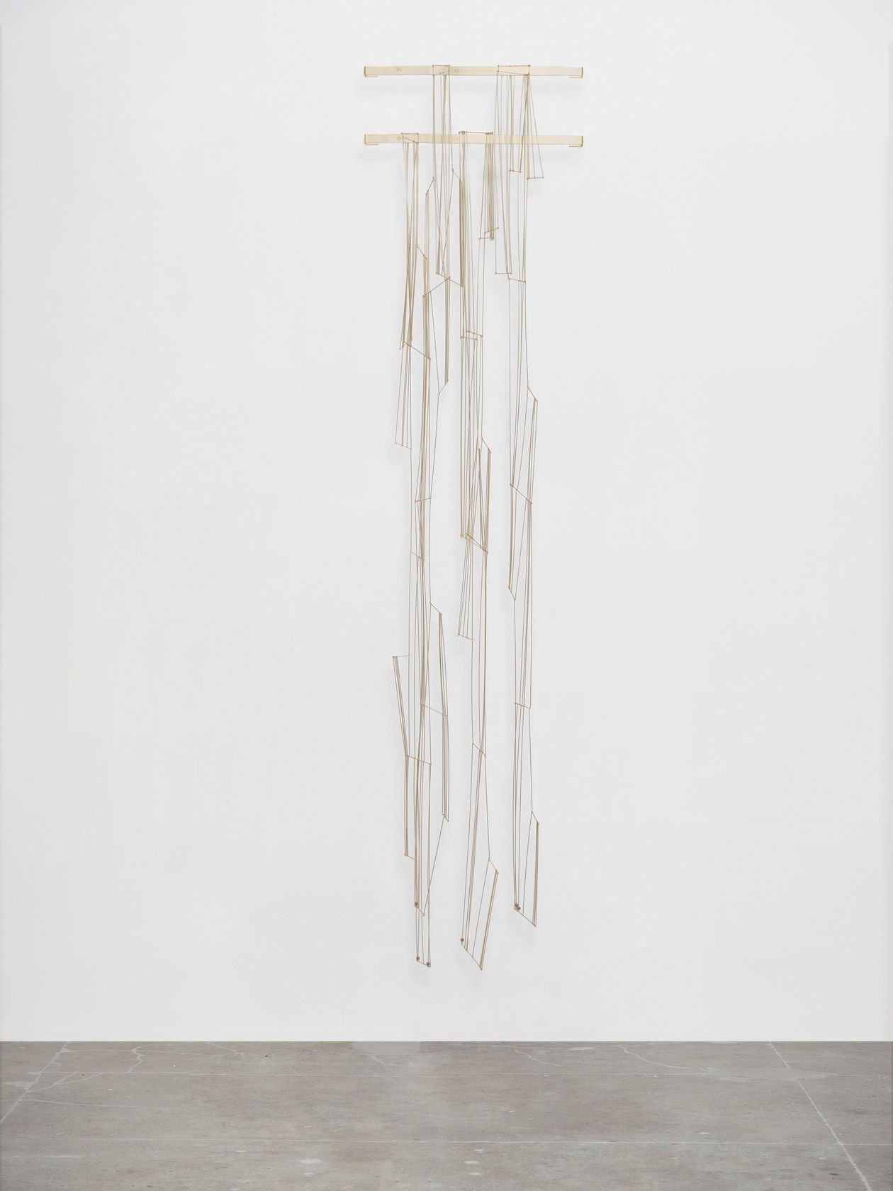 Leonor Antunes discrepancies with W.W. #17, 2025 Brass, acrylic beads Dimensions variable Laid Flat Dimensions from left to right: a....