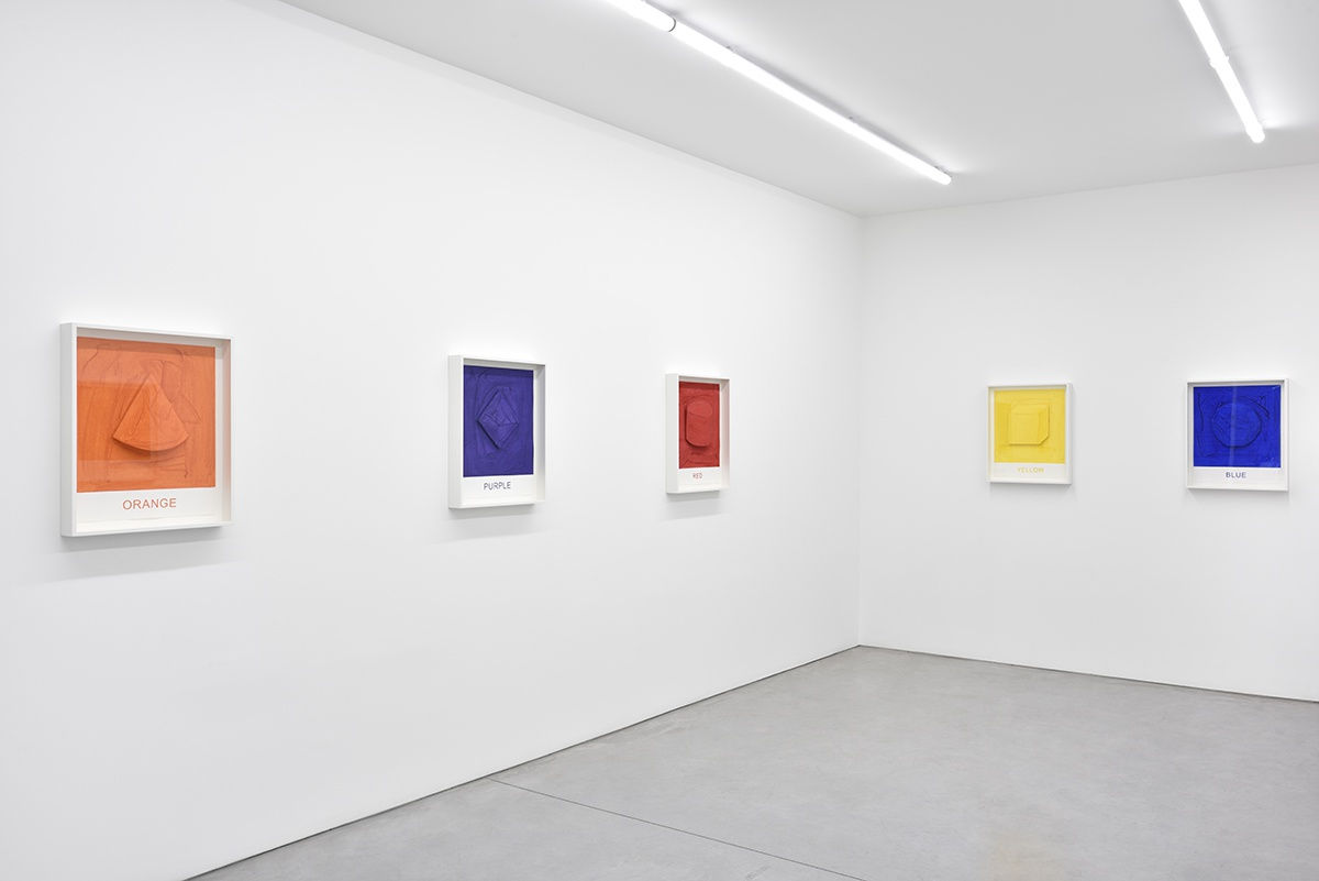 5 framed colorful artworks hang in the gallery.