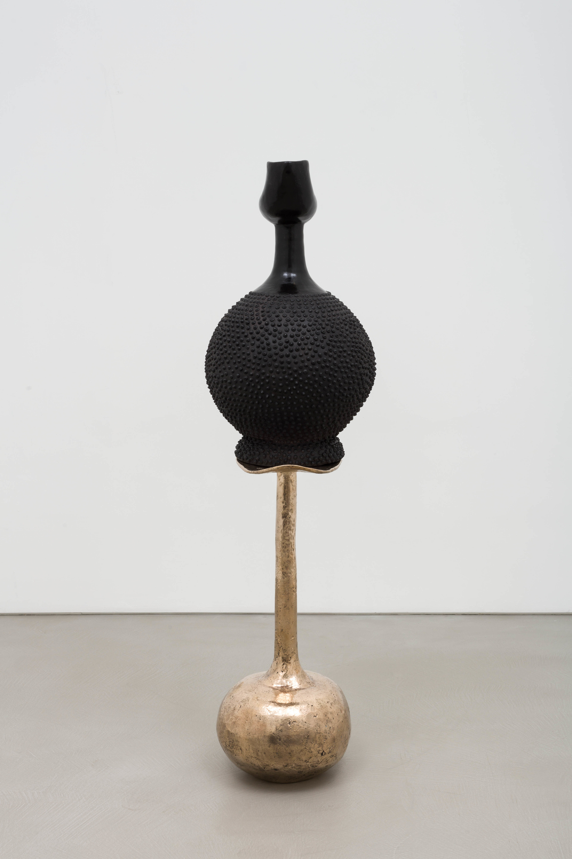 Lina Iris Viktor black indigo on golden stool2024 Stoneware clay, India ink & renaissance wax finish, lost wax cast silica...