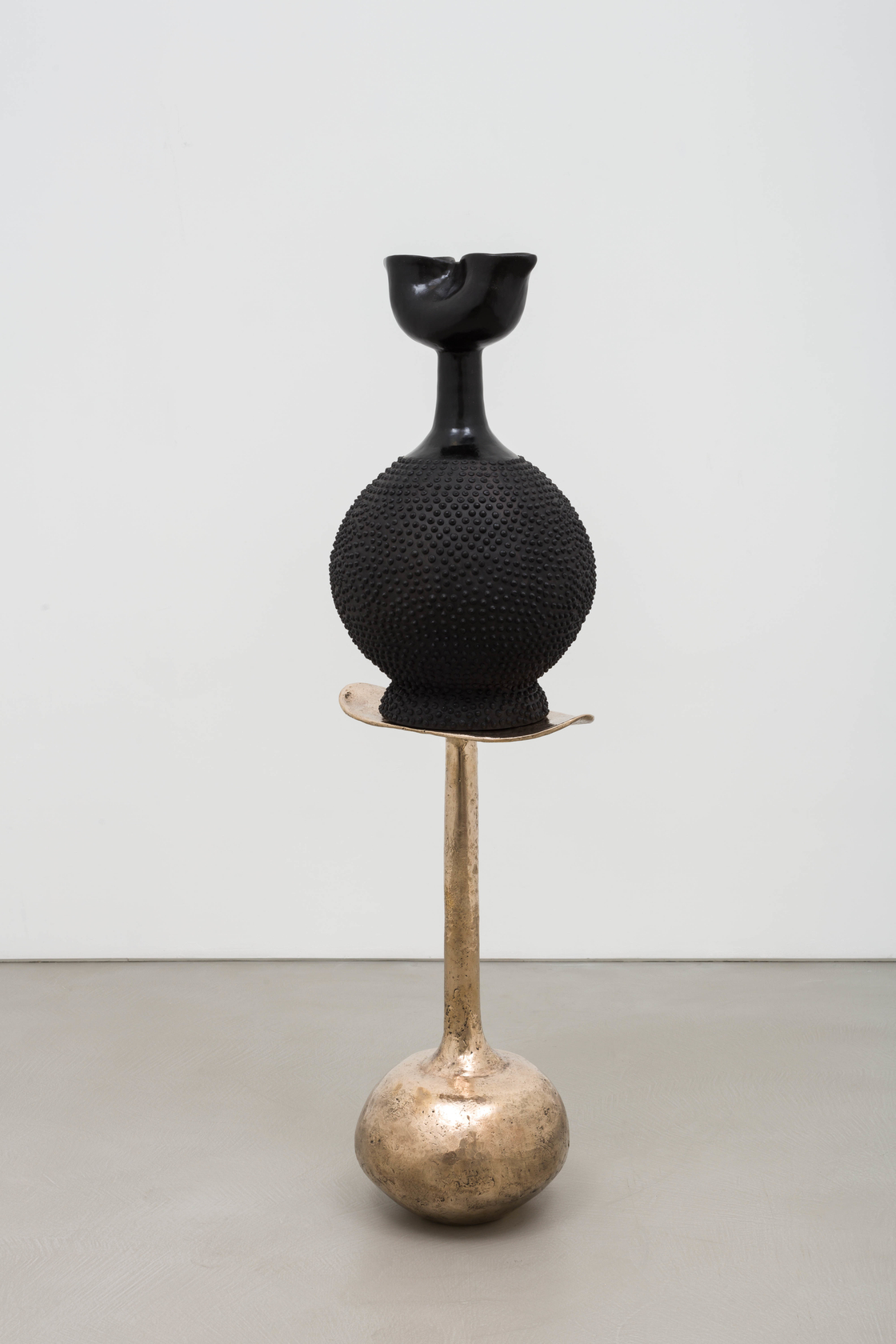Lina Iris Viktor black indigo on golden stool2024 Stoneware clay, India ink & renaissance wax finish, lost wax cast silica...