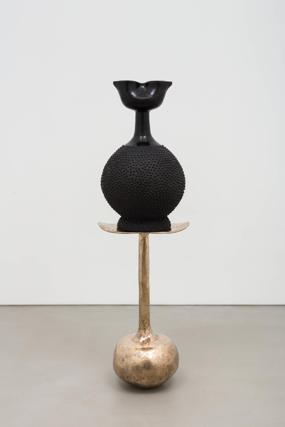 Lina Iris Viktor black indigo on golden stool2024 Stoneware clay, India ink & renaissance wax finish, lost wax cast silica...