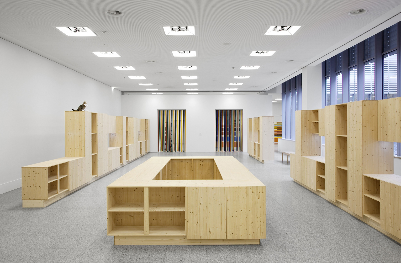 How Are You Going to Behave? A Kitchen Cat Speaks, 2009 Wood, lamps, stuffed cat, text, door blinds, MP3 player...