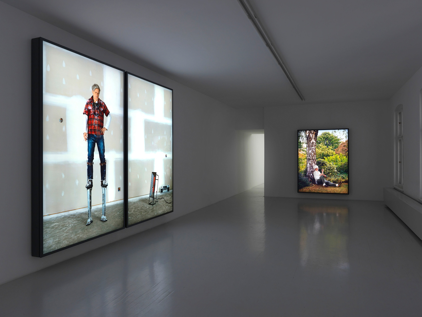 Smoke Break 2 (Drywaller), 2012 (left) Painted aluminium light box with transmounted chromogenic transparency 303,8 x 182 x 19 cm...