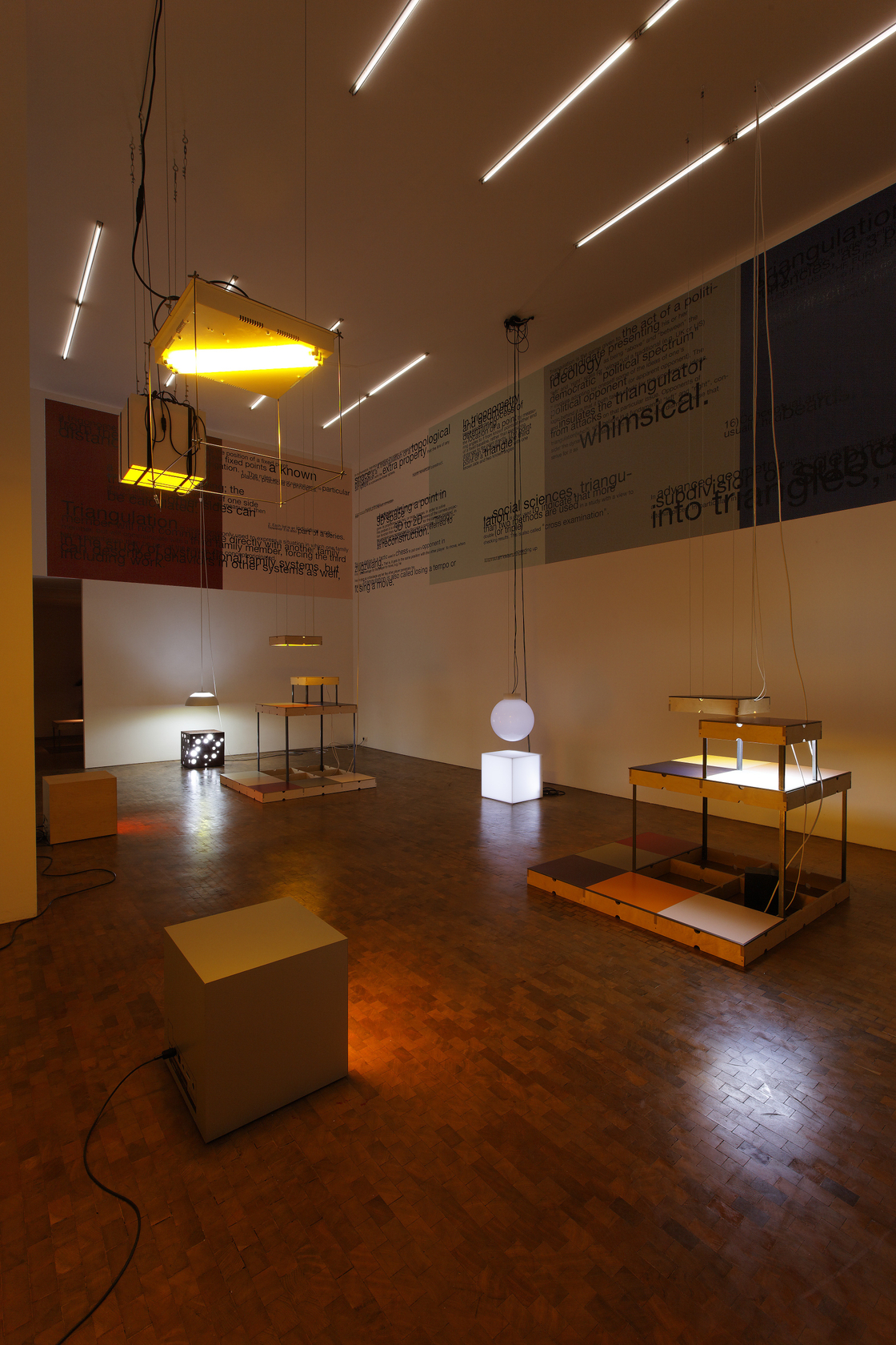 International Aluminium Double Cube Triangle - Yellow, 2010 (front, left) Aluminium Pixel box with yellow lamps, wire cube frame, Pixel...