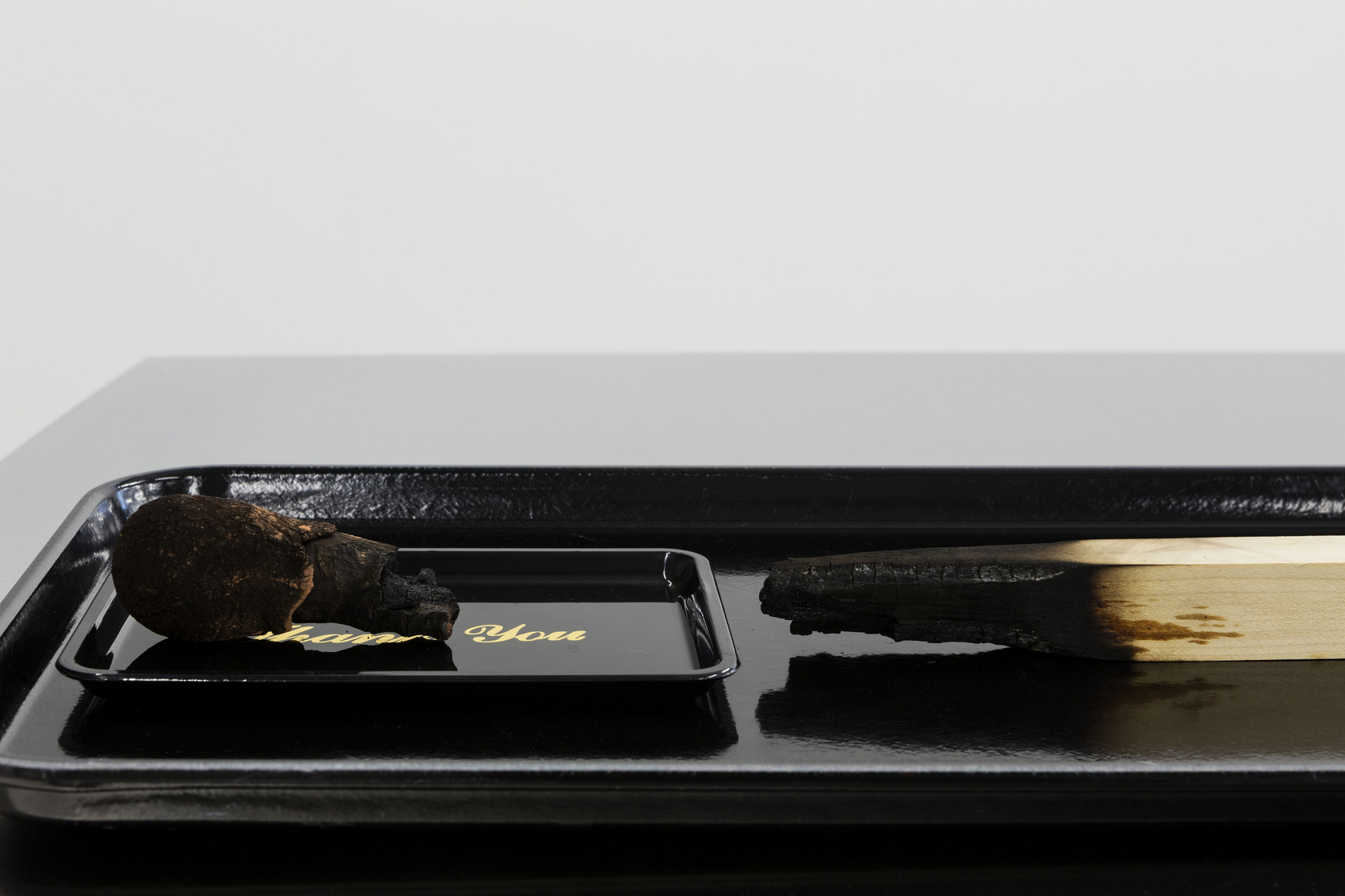 Untitled (Balance Over Consumption), 2016 (detail) Wood, blanket, plastic tray The work consists of an assemblage of ready-made objects piled...