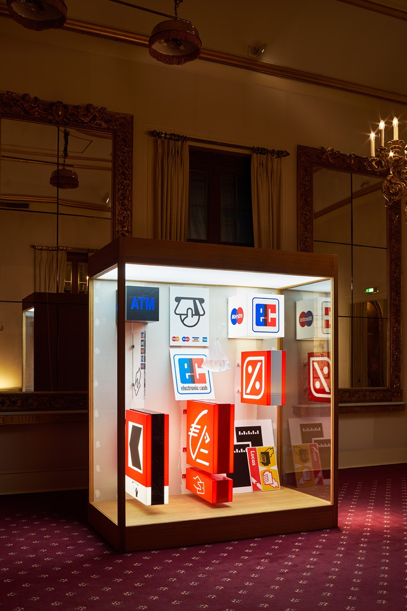 Forecast, 2015 Mixed media in wood and plexiglas vitrine with interior lighting A frequent sight in the global urban landscape,...