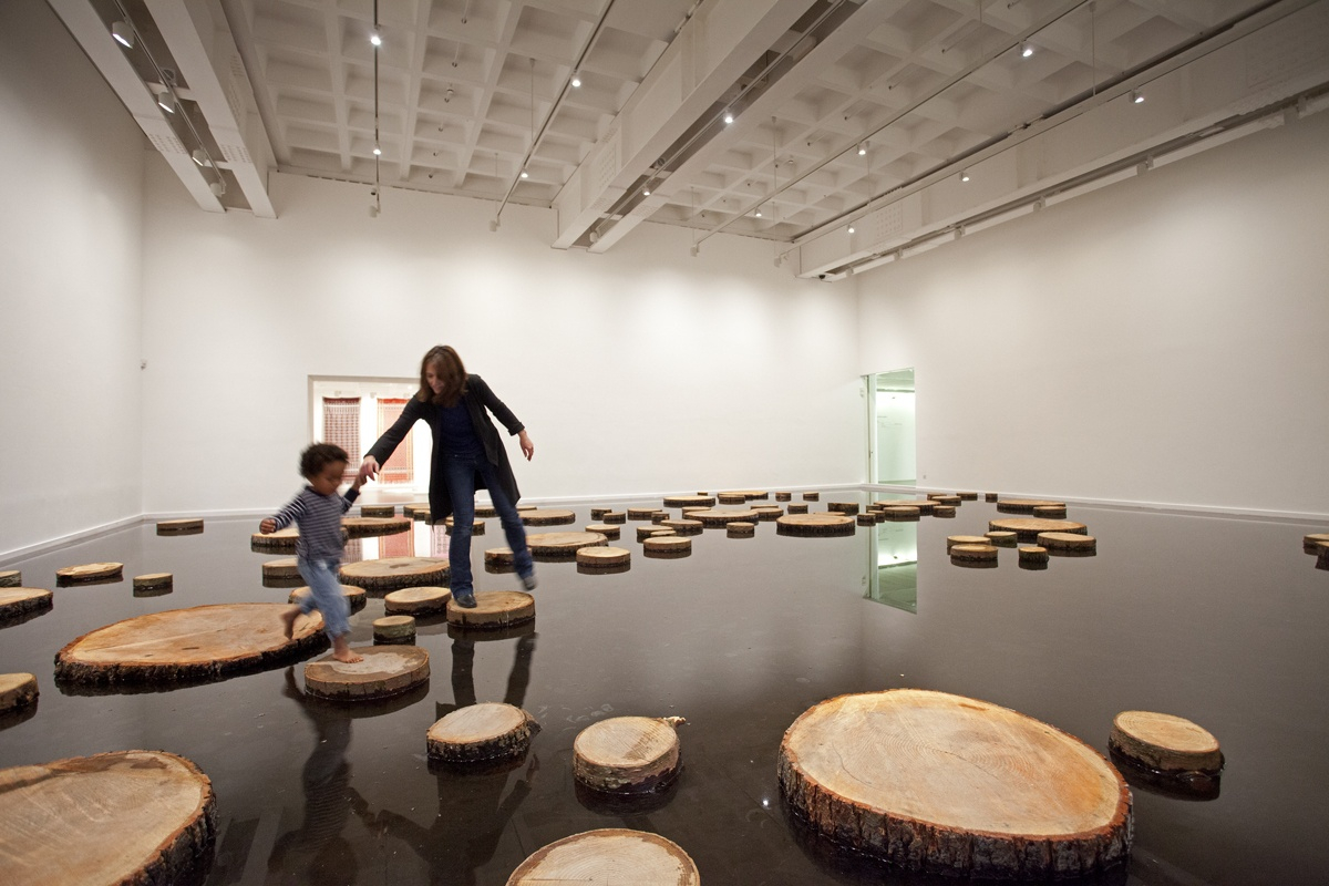 R.T/S.R/V.S, 2003/2012 Tree discs, pond, water The pond takes as its point of departure the opening sequence of Satyajit Rays'...