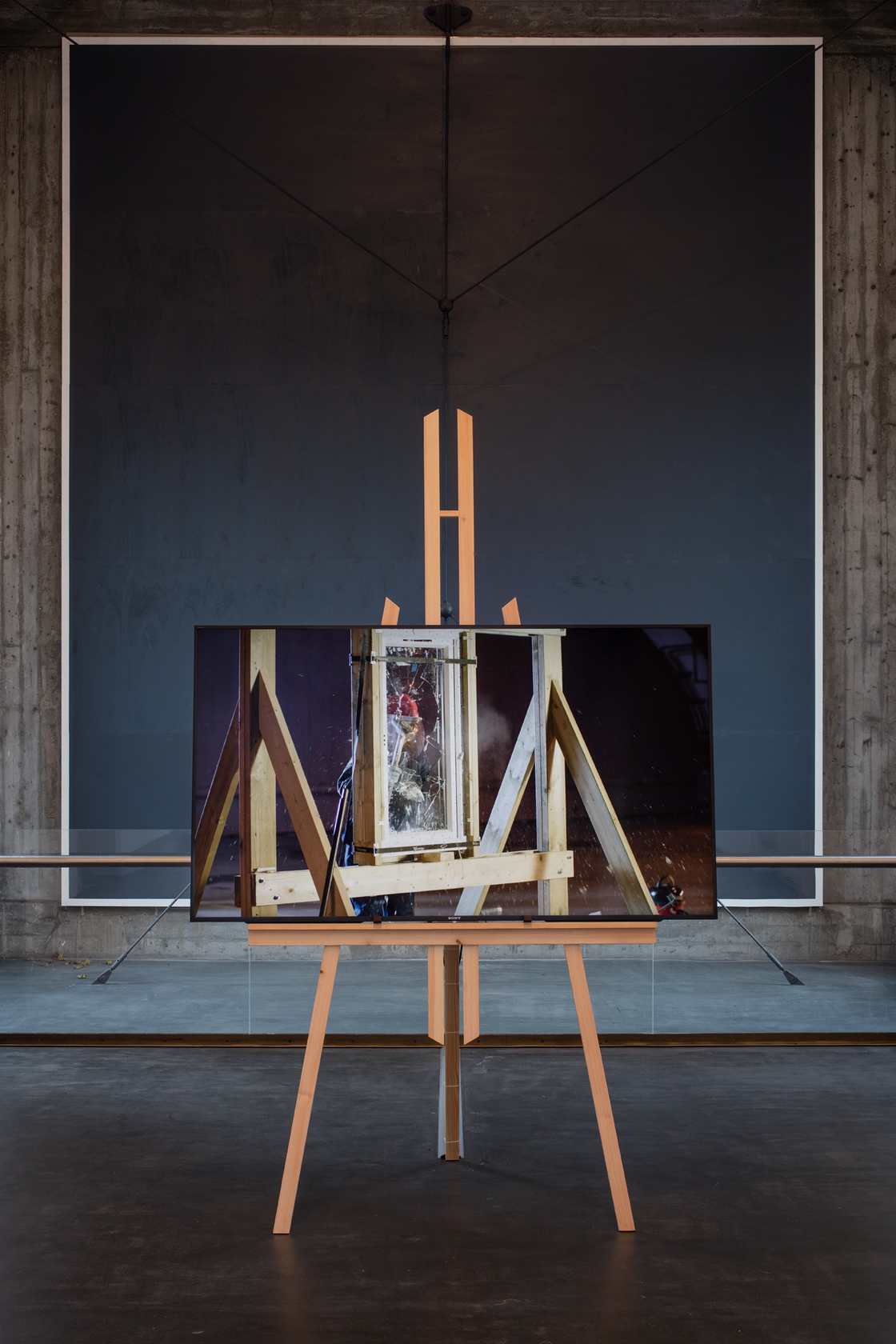 The City of Broken Windows, 2018 Two-channel video (HD, colour, sound), wooden easels, vinyl sticker, panel painting (environment) Variable dimensions...