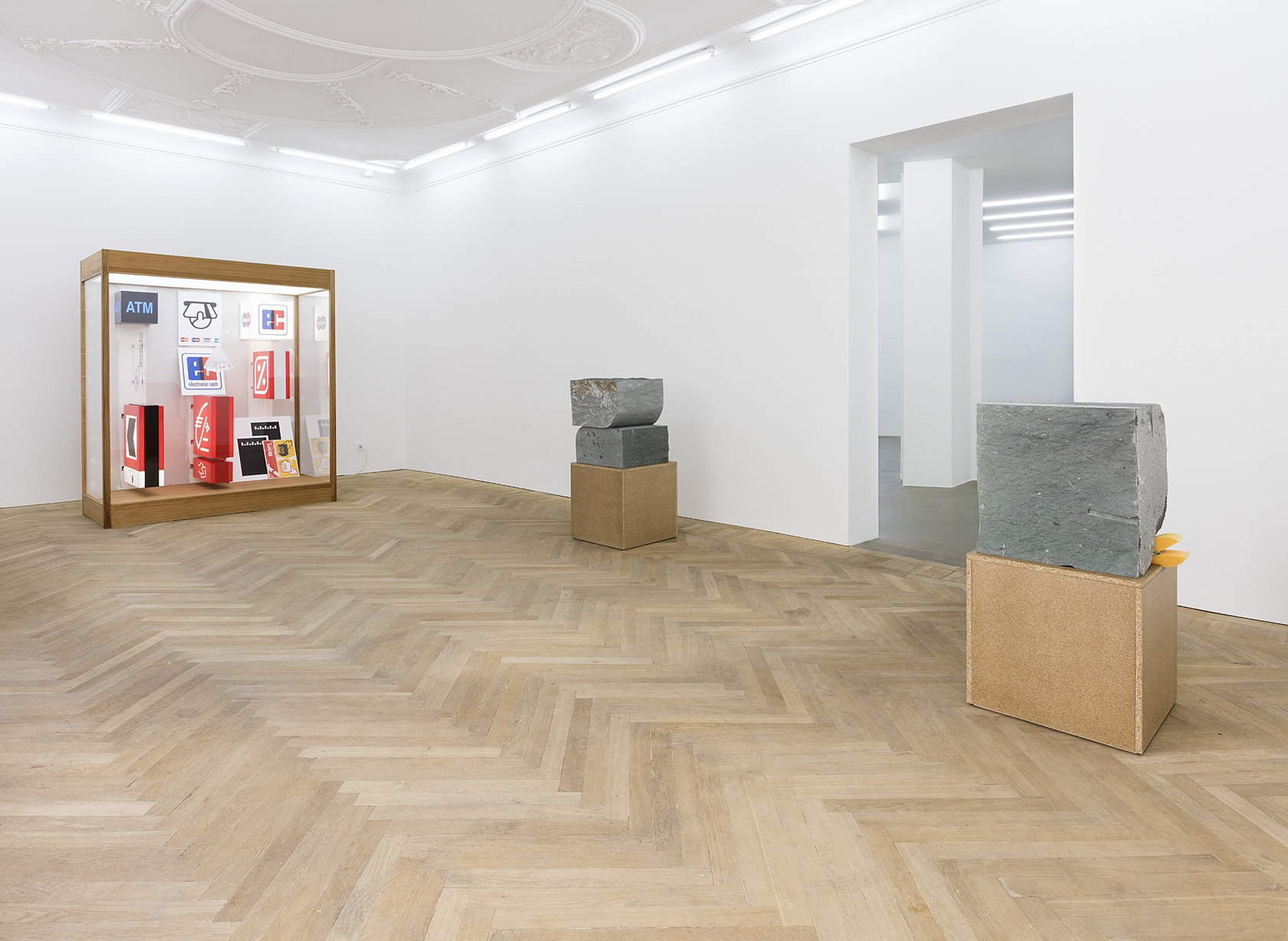 Forecast, 2015 (left) Mixed media in wood and plexiglas vitrine with interior lighting The vitrine contains tightly grouped light boxes...