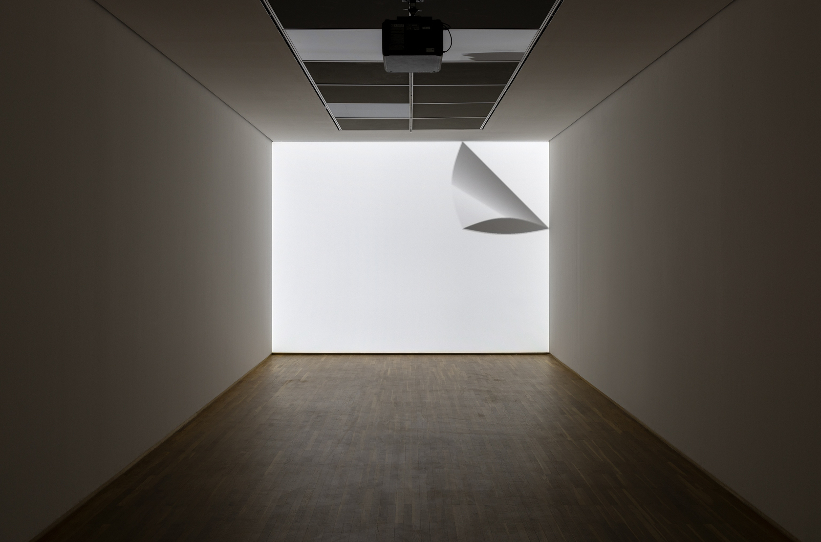 Ceal Floyer, Peel, 2003 DVD-projection/installation (silent loop), DVD, DVD-player, projector Exhibition view: Under Construction, Hamburger Bahnhof, Berlin, 2022 Photo ©...