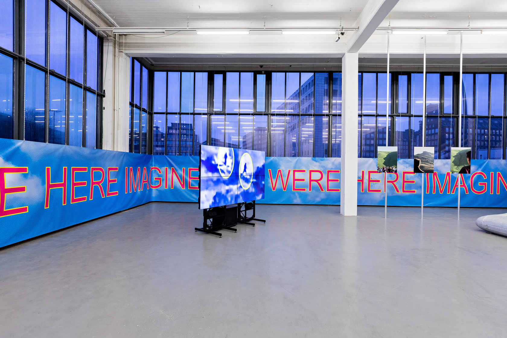 car, road, mountain, 2020 Digital video, site-specific installation with photographs, advertisement banners and airplane slides Dimensions variable Photo © Fred...