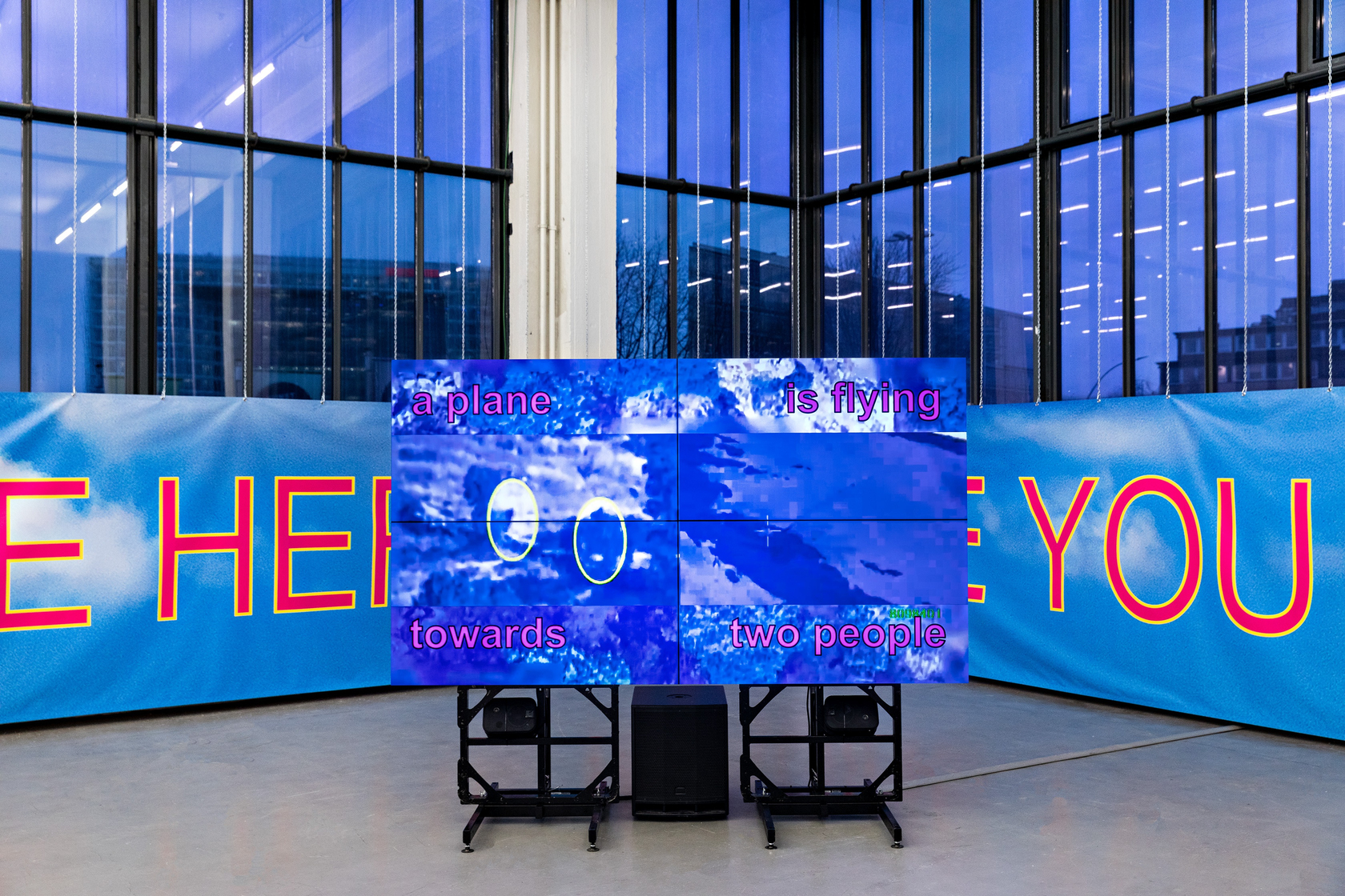 car, road, mountain, 2020 Digital video, site-specific installation with photographs, advertisement banners and airplane slides Dimensions variable Photo © Fred...