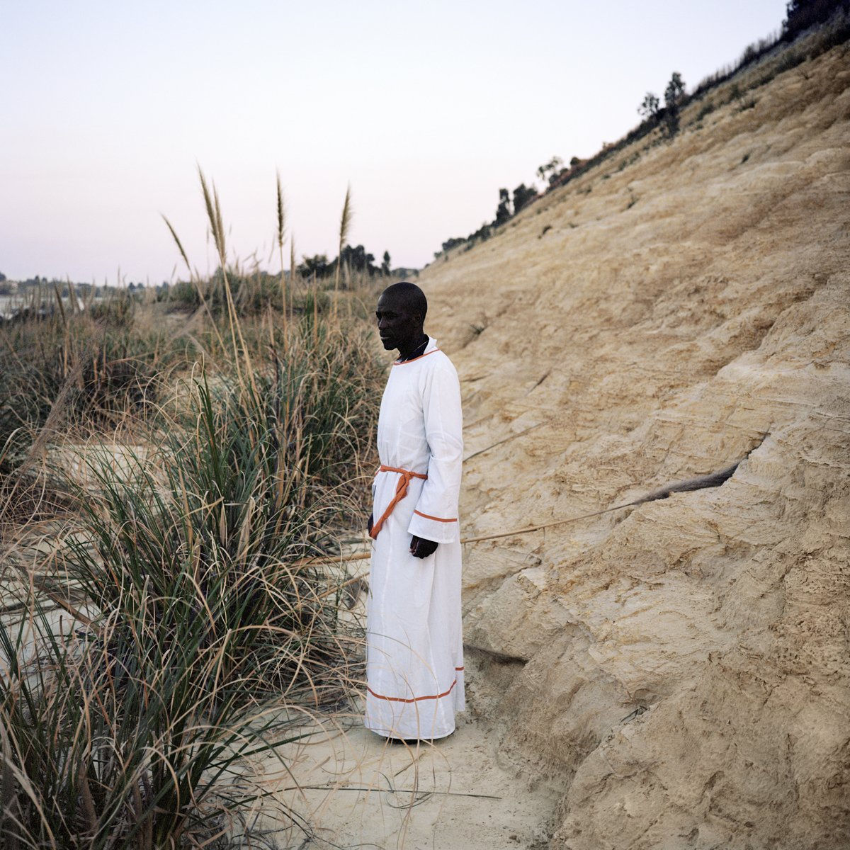 Jason Larkin Mike Dwjela, after his evening prayer, Boysens, Johannesburg, 2010