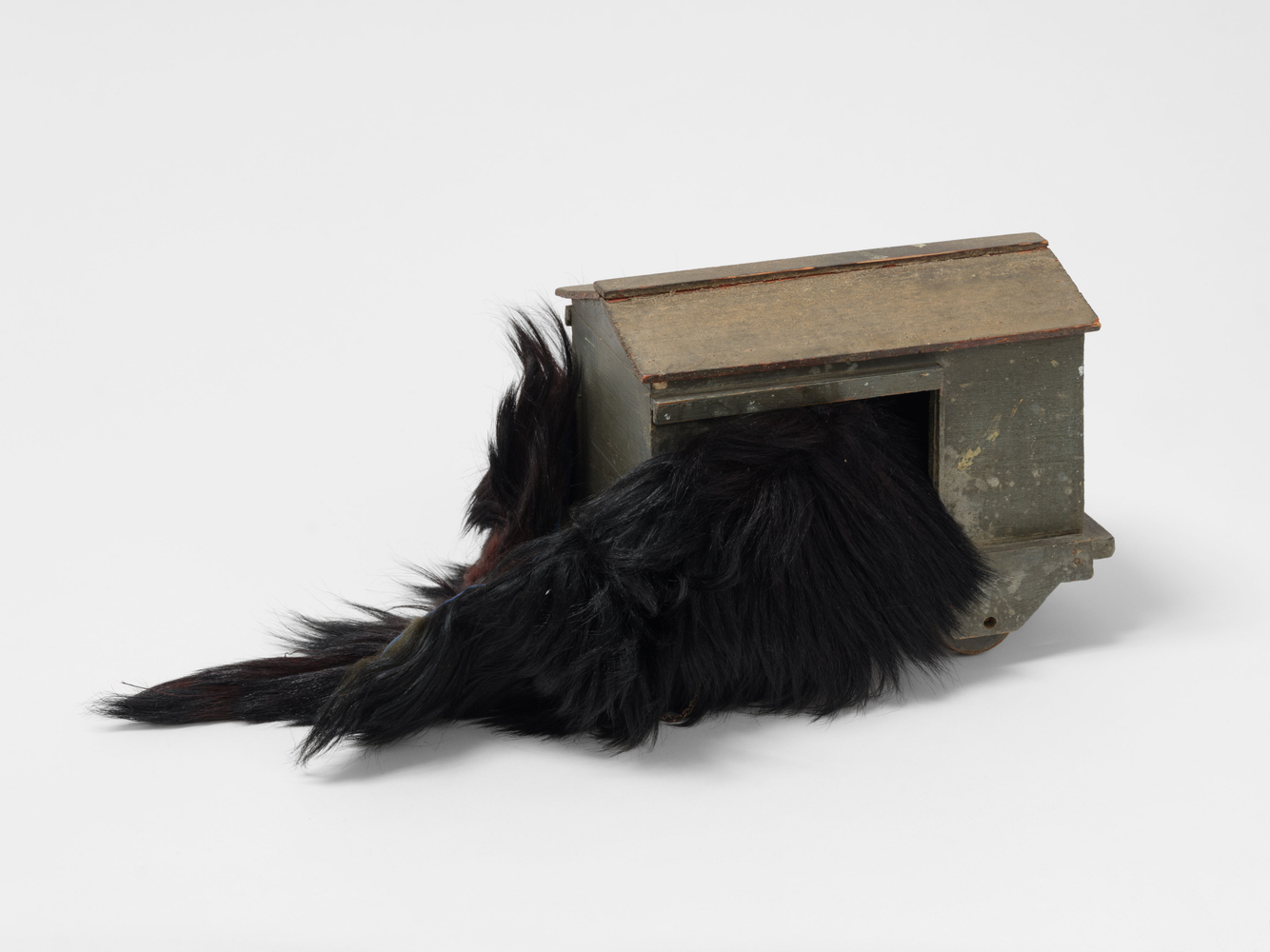 Terry Adkins
Monkey Man, 2008
wood and artificial fur with satin lining
overall: 10 1/2 x 26 x 12 in. (26.7 x 66 x 30.5 cm)

fur: 3 x 36 x 10 in. (7.6 x 91.4 x 25.4 cm)

wooden element: 10 1/2 x 7 3/4 x 13 in. (26.7 x 19.7 x 33 cm)