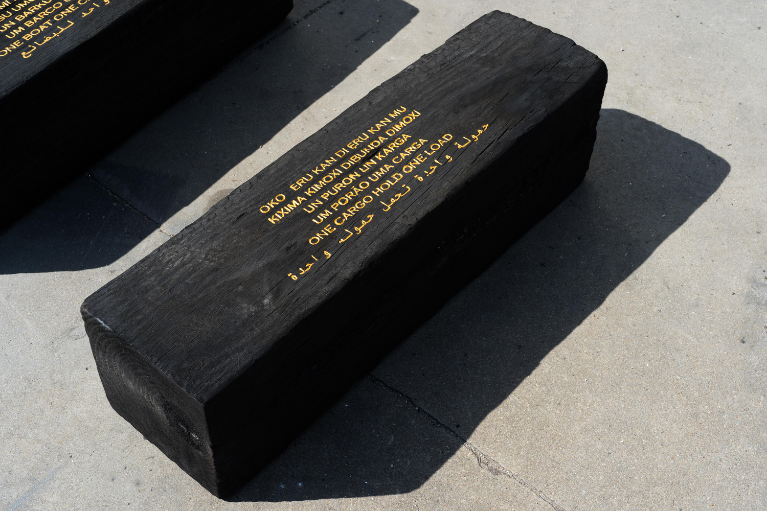 Grada Kilomba

Untitled Poem (one cargo hold, one load), 2022

Charcoal log with gold leaf engraving

30 x 30 x 90 cm / 11.8 x 11.8 x 35.4 in.

Enquire