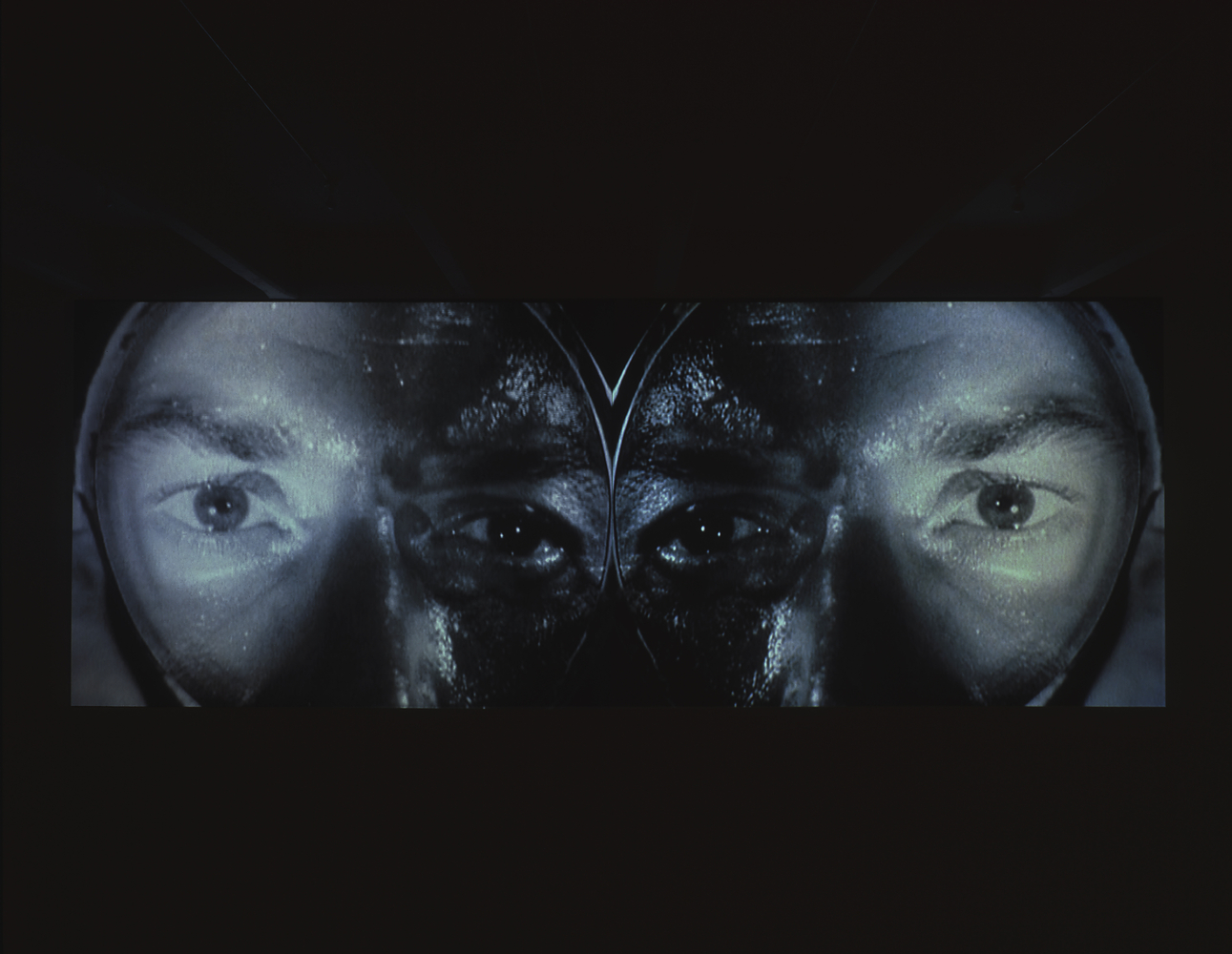 Installation view of video work by Douglas Gordon