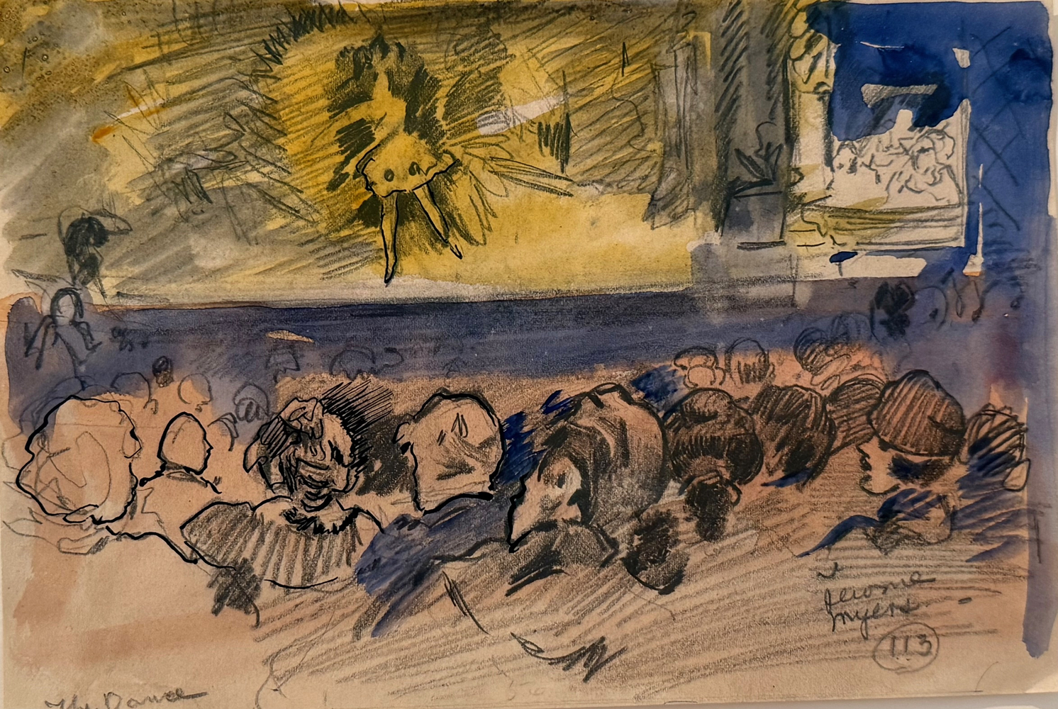 view of a dancer on a stage with audience in the foreground