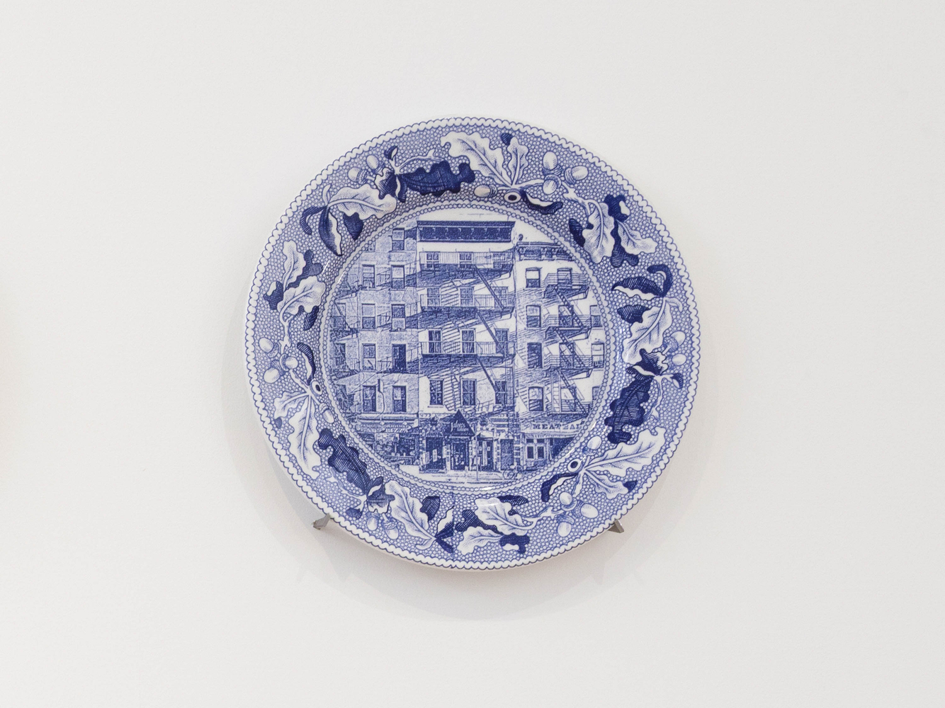 PAUL SCOTT

Cumbrian Blue(s), New American Scenery, Fleur de Sel&amp;#39;s New York (set of twelve plates) No.1, 2019

Transfer print collage on salvaged Syracuse China with pearlware glaze

11&amp;rdquo; Dia. x 1&amp;rdquo; D (each)