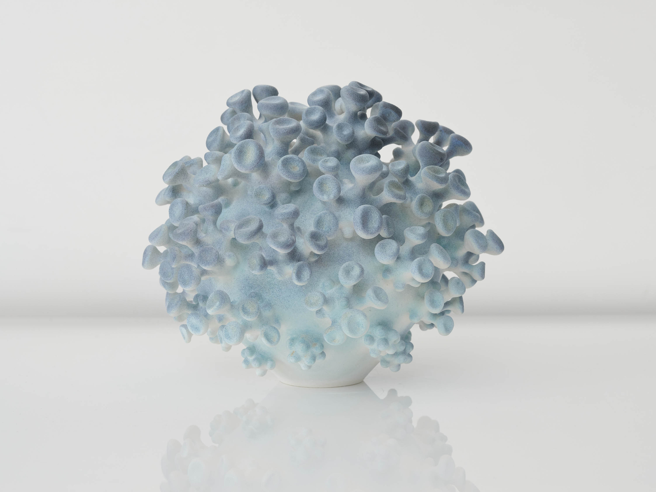 EVA ZETHRAEUS

Shimmering Pale Blue Cluster, 2025

Glazed porcelain

13.75&amp;quot; H x 15&amp;quot; Dia.