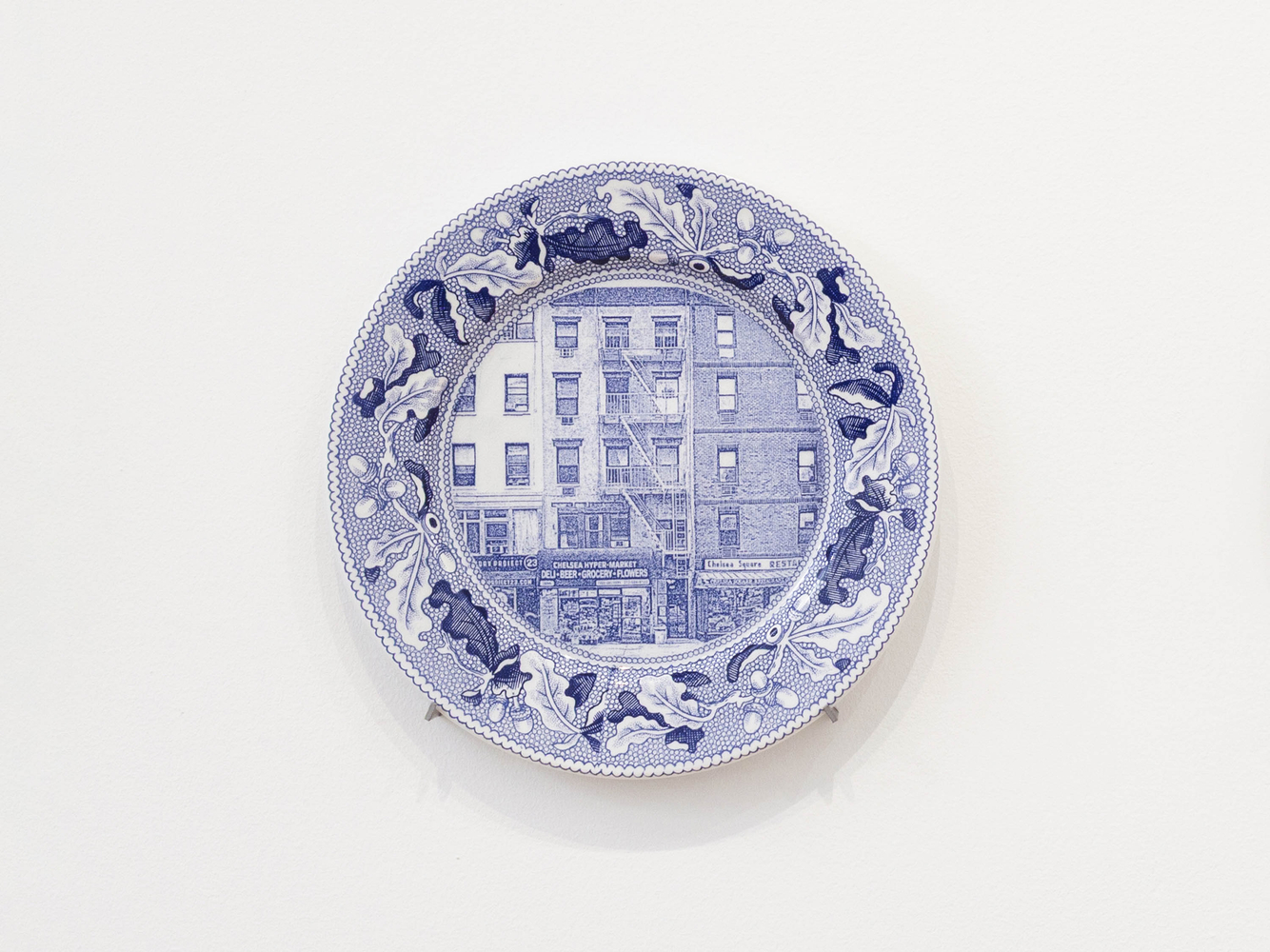 PAUL SCOTT

Cumbrian Blue(s), New American Scenery, Fleur de Sel&amp;#39;s New York (set of twelve plates) No.1, 2019

Transfer print collage on salvaged Syracuse China with pearlware glaze

11&amp;rdquo; Dia. x 1&amp;rdquo; D (each)