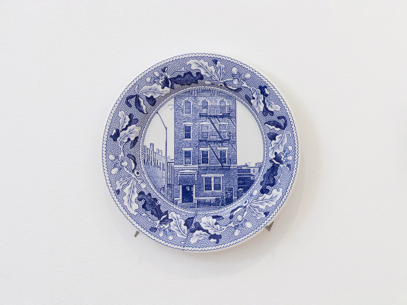 PAUL SCOTT

Cumbrian Blue(s), New American Scenery, Fleur de Sel&amp;#39;s New York (set of twelve plates) No.1, 2019

Transfer print collage on salvaged Syracuse China with pearlware glaze

11&amp;rdquo; Dia. x 1&amp;rdquo; D (each)