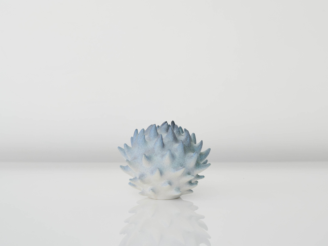 EVA ZETHRAEUS

Small Pale Blue Pod, 2025

Glazed porcelain

6&amp;quot; H x 7&amp;quot; Dia.
