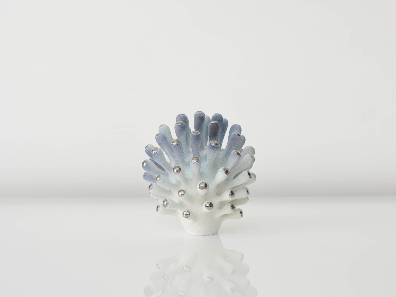 EVA ZETHRAEUS

Pale Turquoise Cluster with Platinum Details, 2025

Glazed porcelain, platinum

8.5&amp;quot; H x 7.75&amp;quot; Dia.
