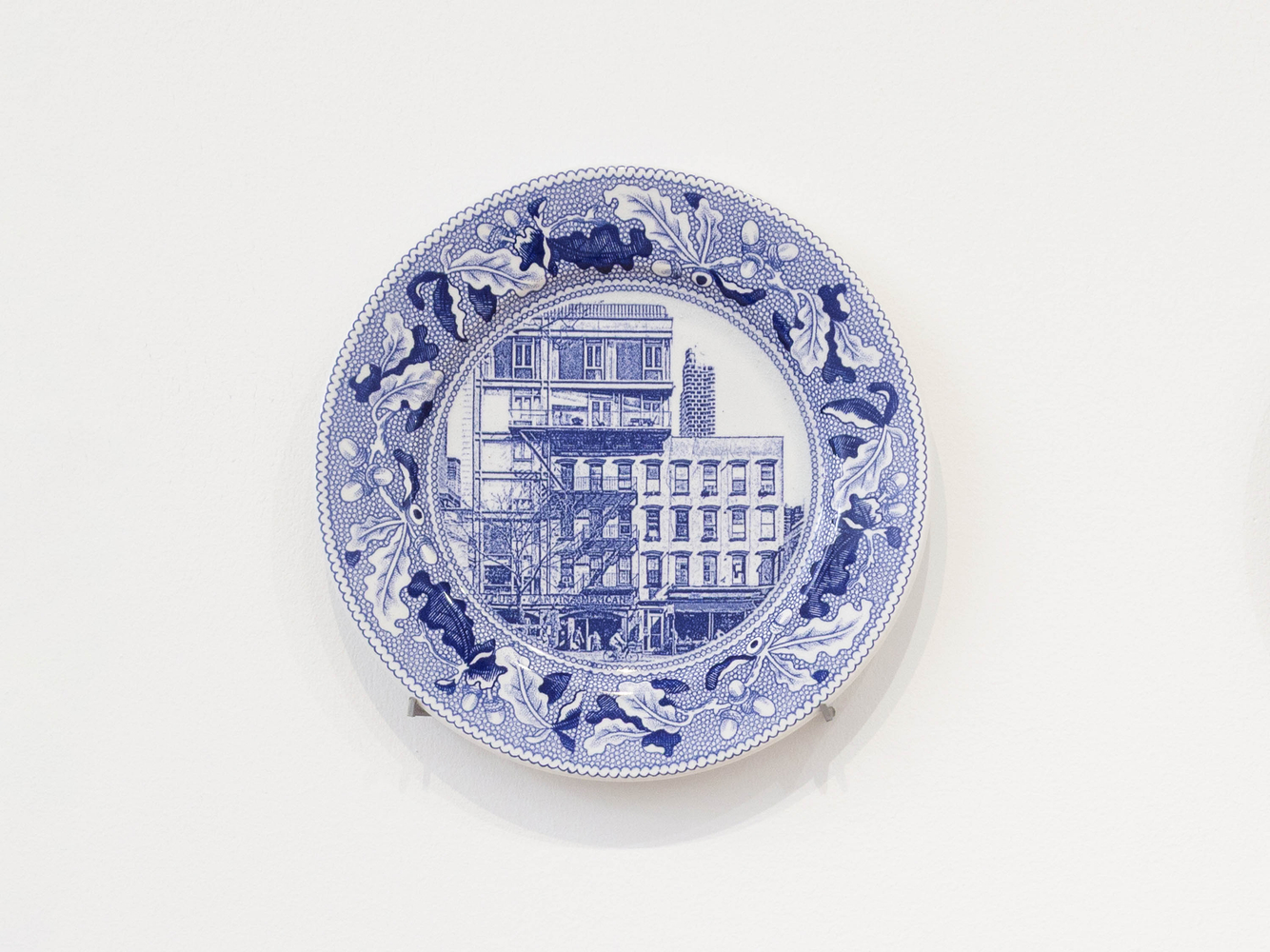 PAUL SCOTT

Cumbrian Blue(s), New American Scenery, Fleur de Sel&amp;#39;s New York (set of twelve plates) No.1, 2019

Transfer print collage on salvaged Syracuse China with pearlware glaze

11&amp;rdquo; Dia. x 1&amp;rdquo; D (each)