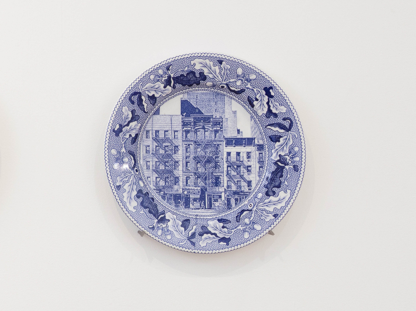 PAUL SCOTT

Cumbrian Blue(s), New American Scenery, Fleur de Sel&amp;#39;s New York (set of twelve plates) No.1, 2019

Transfer print collage on salvaged Syracuse China with pearlware glaze

11&amp;rdquo; Dia. x 1&amp;rdquo; D (each)