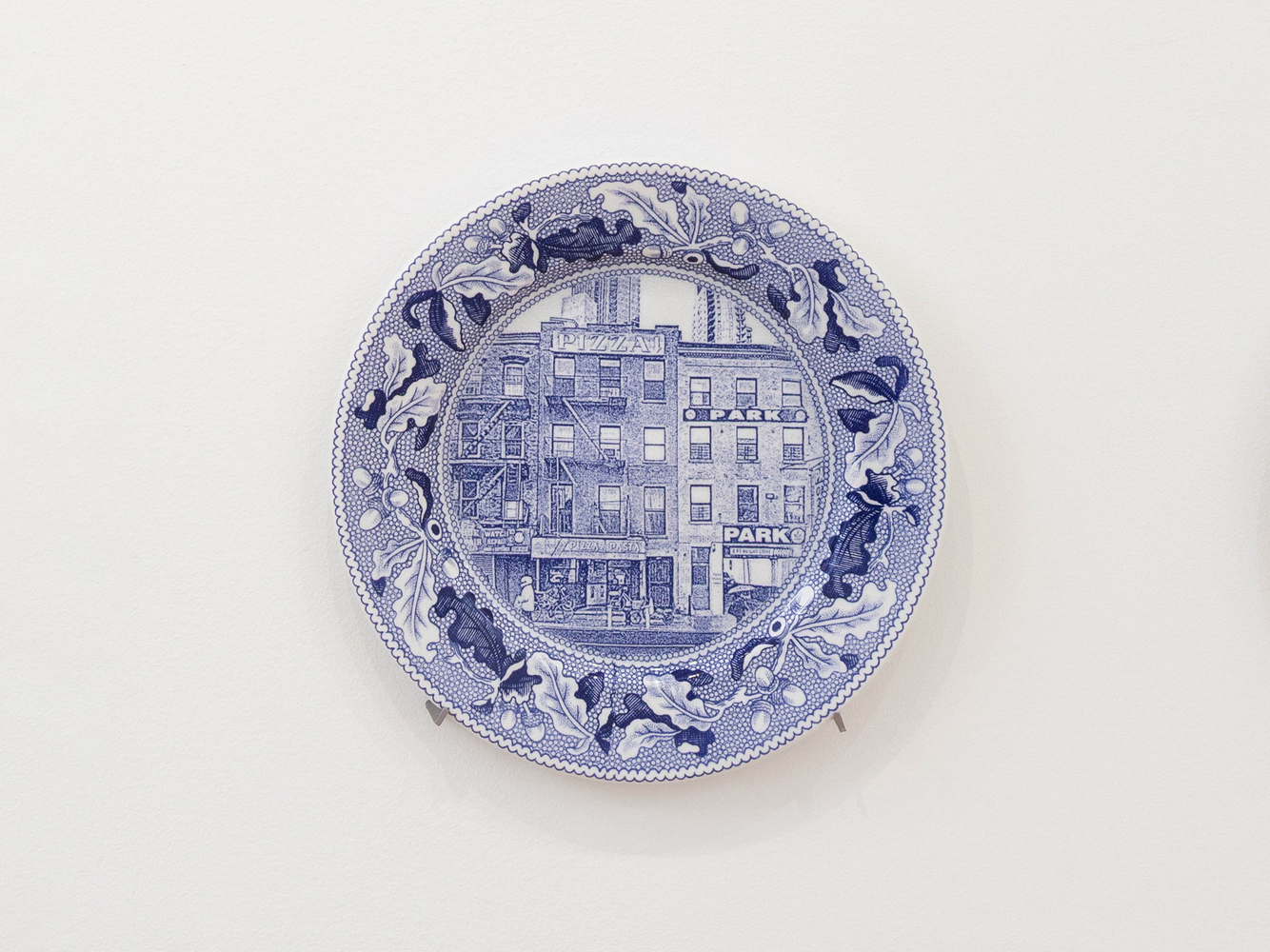 PAUL SCOTT

Cumbrian Blue(s), New American Scenery, Fleur de Sel&amp;#39;s New York (set of twelve plates) No.1, 2019

Transfer print collage on salvaged Syracuse China with pearlware glaze

11&amp;rdquo; Dia. x 1&amp;rdquo; D (each)