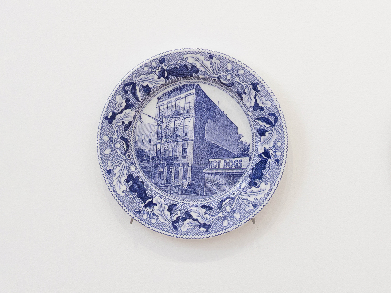 PAUL SCOTT

Cumbrian Blue(s), New American Scenery, Fleur de Sel&amp;#39;s New York (set of twelve plates) No.1, 2019

Transfer print collage on salvaged Syracuse China with pearlware glaze

11&amp;rdquo; Dia. x 1&amp;rdquo; D (each)