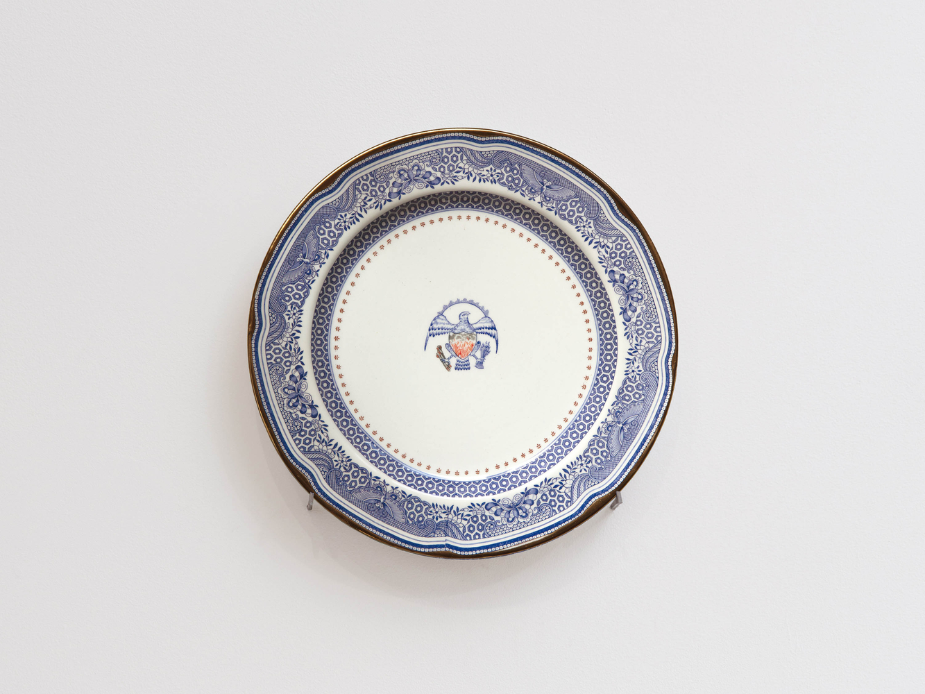 PAUL SCOTT

Cumbrian Blue(s), New American Scenery, Heritage and The Sleep of Reason, 2025

Transfer print collage and gold on pearlware plate

11.25&amp;rdquo; Dia. x 0.5&amp;rdquo; D&amp;rdquo;