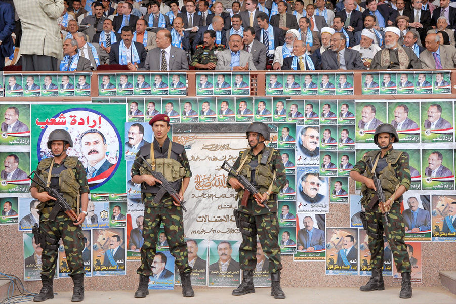 Ammar Abd Rabbo, Yemeni President Ali Abdullah Saleh (center) attends an elections rally in Sanaa, 2006