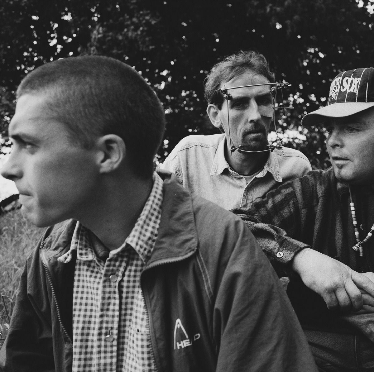Ken Grant, Tommy Haygarth and Man with a Face Brace, Birkenhead, 1996