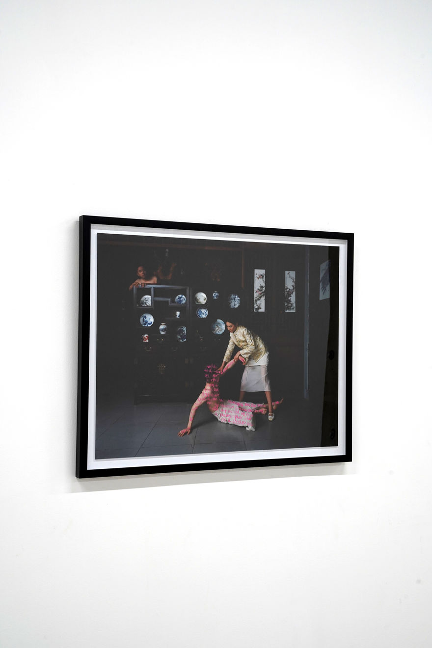 photo of a woman picking up a man off the ground