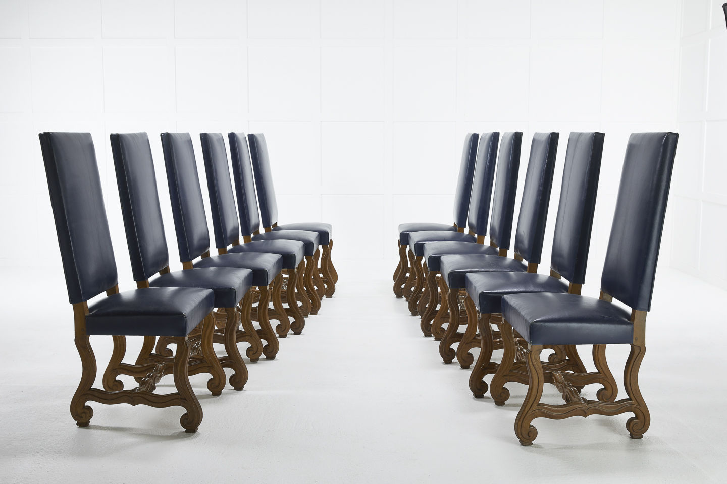 Set of Twelve 1940s French Walnut and Blue Leather Chairs