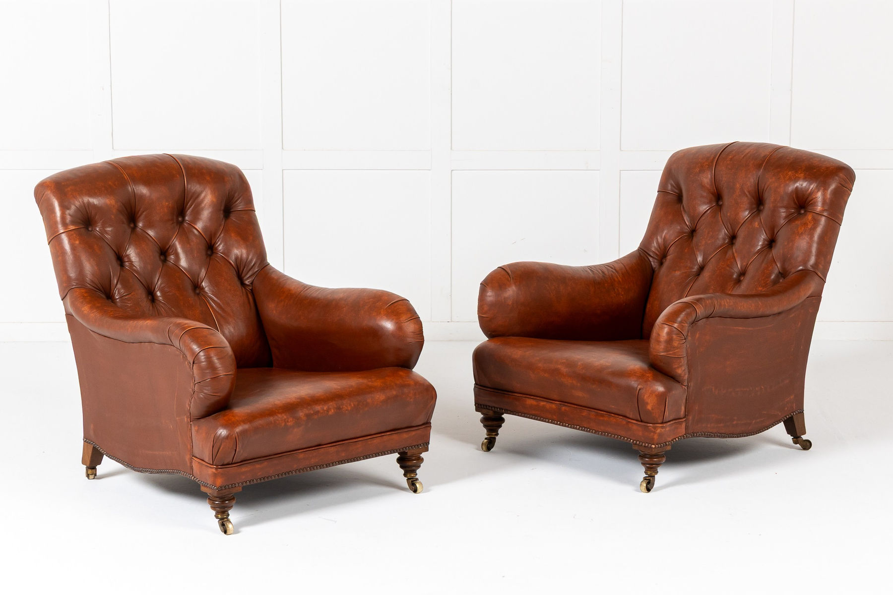 Pair of 19th Century English Howard Style Walnut Armchairs