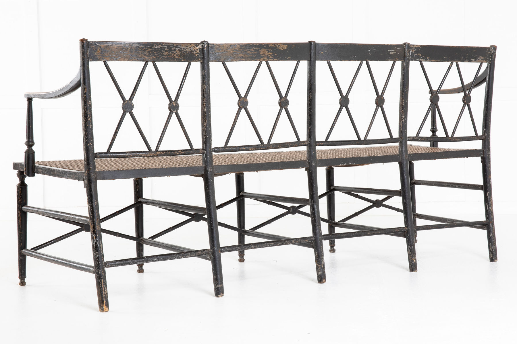 SOLD, English 19th Century Regency Ebonised Cane Seat Sofa