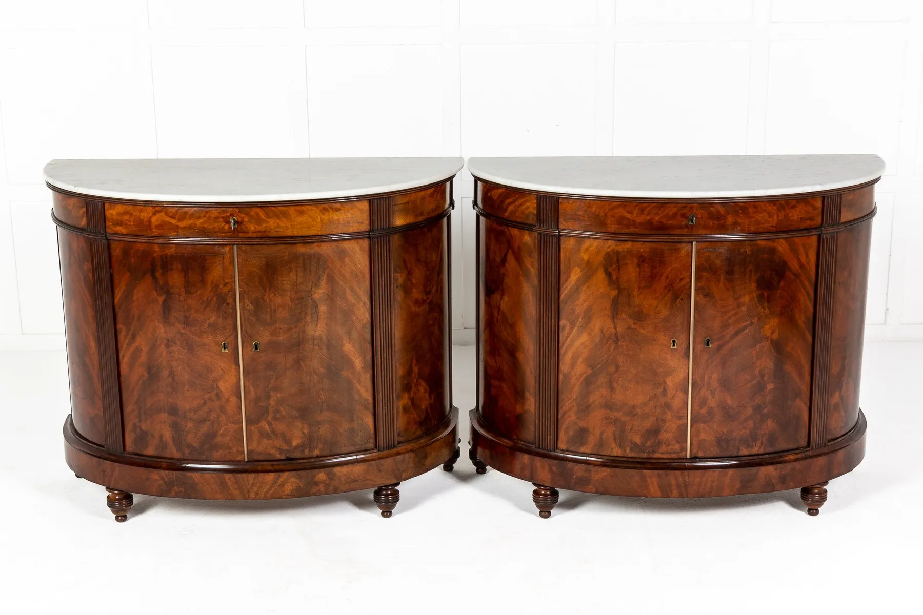 Pair of Early 19th Century Mahogany Demi Lune Cabinets